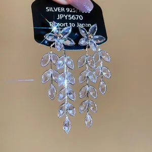Elegant S925 silver flower tassel earrings with sparkling leaf-shaped zircon dangles