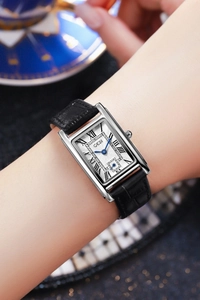 Elegant rectangular quartz watch for women with silver case and black leather strap