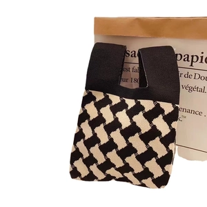 Knitted checkerboard tote bag in black and white stripes for women casual autumn style