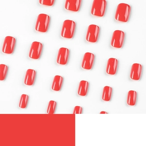 Short square glossy coral red press on nails set with a high shine finish on white background