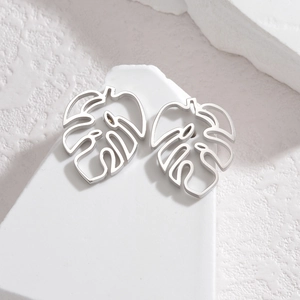 Minimalist silver monstera leaf cutout earrings made of high-quality stainless steel
