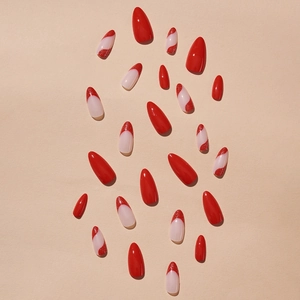 Red glitter french almond press-on nails with stylish swirl patterns in a 24-piece set