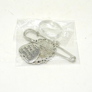 Silver commemorative photo frame brooch with engraved heart charm and safety pin