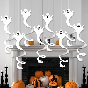 Hanging white ghost decorations with spiral swirls for Halloween fireplace setup