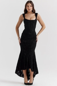 Detailed close-up of the elegant black lace floral texture on this chic fishtail evening gown