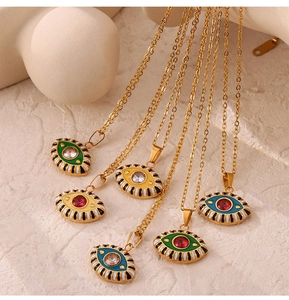 Detailed close-up of colorful evil eye necklaces with gold plating and rhinestones