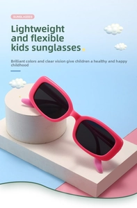 Detail of rose pink rectangular children's sunglasses with polarized black lenses
