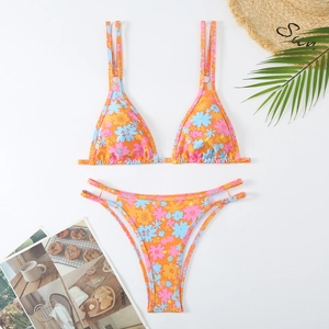 Flat lay of floral bikini with double shoulder straps and high-cut bottoms