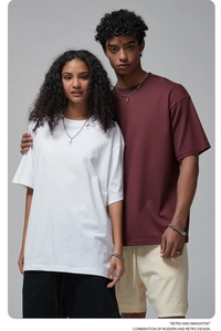 Detail view of oversized cotton t-shirt with ribbed crew neck and premium fabric texture