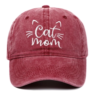 Vintage washed burgundy baseball cap featuring white Cat Mom embroidery in front view