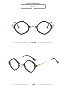 Detail view of punk rhombus sunglasses featuring black frames and gold metal temples