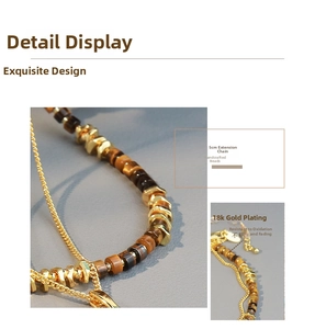 Detail of tiger eye beaded necklace with 18k gold plating and 5cm extension chain