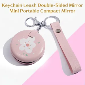 Pink PU leather mini folding makeup mirror with flower patterns and silver keychain