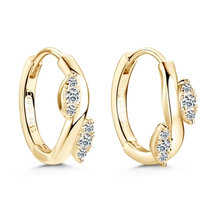 Close-up of S925 gold plated leaf earrings showing intricate moissanite stone setting