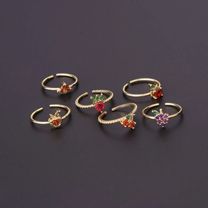 Colorful mini fruit zircon rings with strawberry and cherry charms in adjustable gold bands