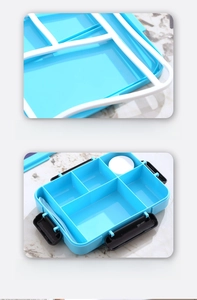 Detail of blue bento box with silicone leak-proof seal and divided compartments