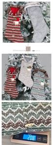 Close-up of knitted Christmas stockings with gnome charms and faux fur trim on a tree