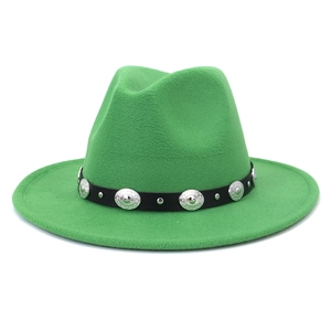 Detail of green fedora hat featuring black belt strap and embossed silver metal buckle