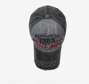 Top view of vintage washed baseball cap with 1985 New York embroidery and retro patchwork