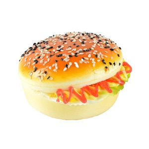 Realistic artificial Pu burger model with sesame seeds shown from a 3D side angle