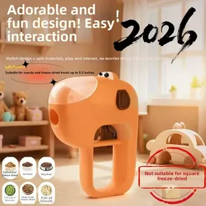 Macro shot of orange pet snack launcher suitable for small round treats under 0.5 cm
