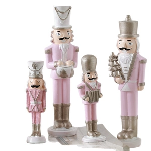 Set of 4 pink and gold wooden Nutcracker soldier figures for Christmas tree decor