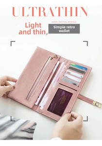 Detail view of pink frosted long wallet showing card slots and zipper pocket