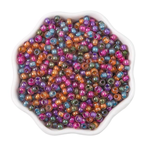 4mm colorful iridescent glass seed beads in a white petal bowl for DIY jewelry making