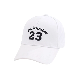 White baseball cap featuring black Est. Number 23 embroidery on minimalist background