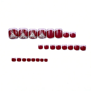 Short square press-on toenails in burgundy with French tips and rhinestones