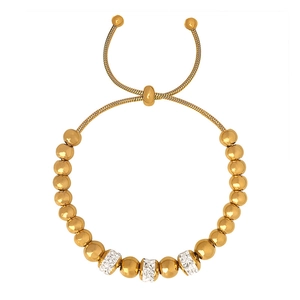 Bracelet à billes dorées polies avec strass blancs et fermoir coulissant ajustable