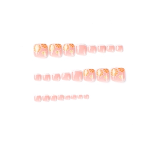 White French tip press-on toenails with orange floral design and peach gradient base