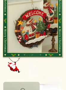 Close-up of Christmas rattan wreath featuring wooden snowman and Welcome sign