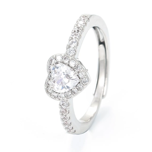 Elegant heart-shaped zircon ring with pavé diamonds in silver setting, 45-degree view