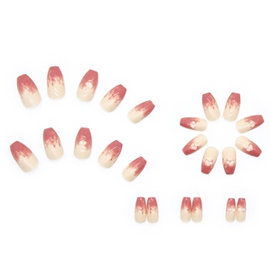 Pink gradient ballerina press-on nails set with white heart accents and coffin shape