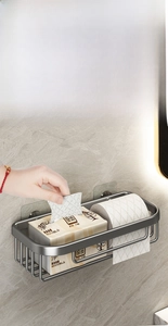 Dual-purpose wall-mounted toilet tissue holder in matte grey for rolls and folded paper
