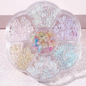 Detail of MH-17 aurora butterfly nail art set with pearls and rhinestones in flower case