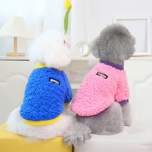 Detailed view of soft pink and blue candy fleece dog sweaters with high-quality texture
