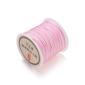 Close-up of pink 0.8mm 72# braided jade cord spool for DIY handmade jewelry crafts