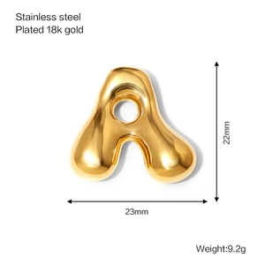 Detail view of 18k gold plated stainless steel letter A charm with size and weight info