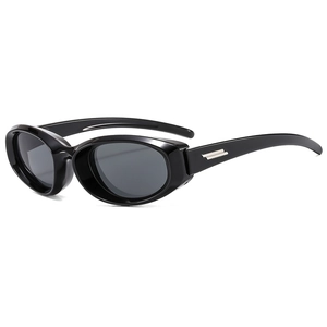 Chic black oval Y2K sunglasses with thick frames and metal temple accents