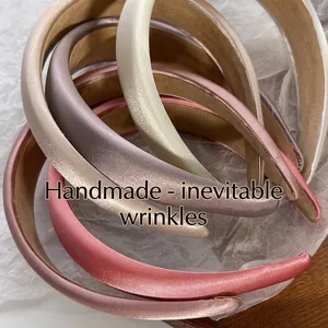 Elegant satin padded headband collection in assorted morandi colors with soft luster