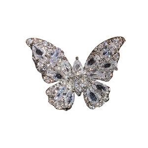Elegant silver butterfly ear cuff with sparkling zircon stones on a clean white background