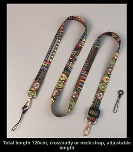 Detail of adjustable crossbody phone strap with ethnic totem pattern and metal clasp