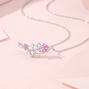 S925 sterling silver necklace with pink heart gem and star-shaped planet pendant