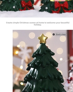 Detail showing back view of green resin Christmas tree with gold star and red bow