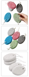 Detail showing colorful oval volcanic pumice stones with porous texture and hanging ropes