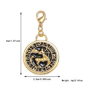 Detail view of gold Sagittarius pendant with zodiac symbols and size dimensions