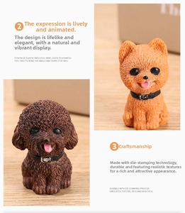 Detail of miniature puppy figurines showing realistic fur texture and flexible inner structure