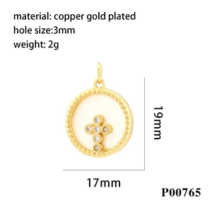 Detailed view of 18K gold plated copper cross pendant with cubic zirconia and shell